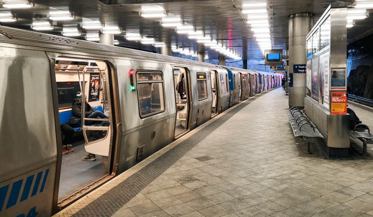 Train platform with subway cars along the station edge